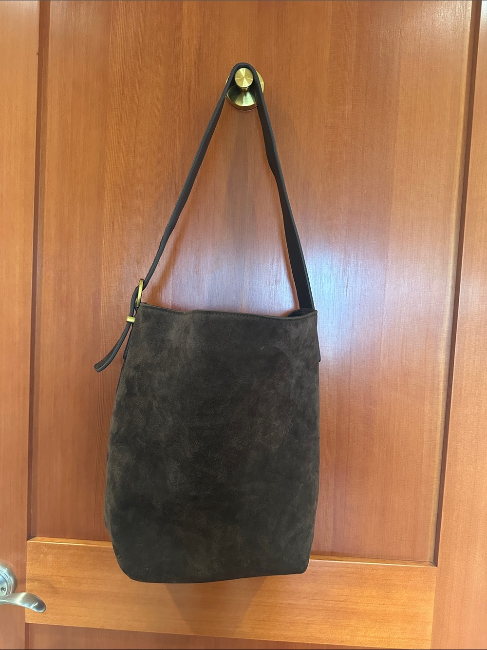 Brown suede/ leather shoulder bag. Carry on suitcase picture for size refrence.